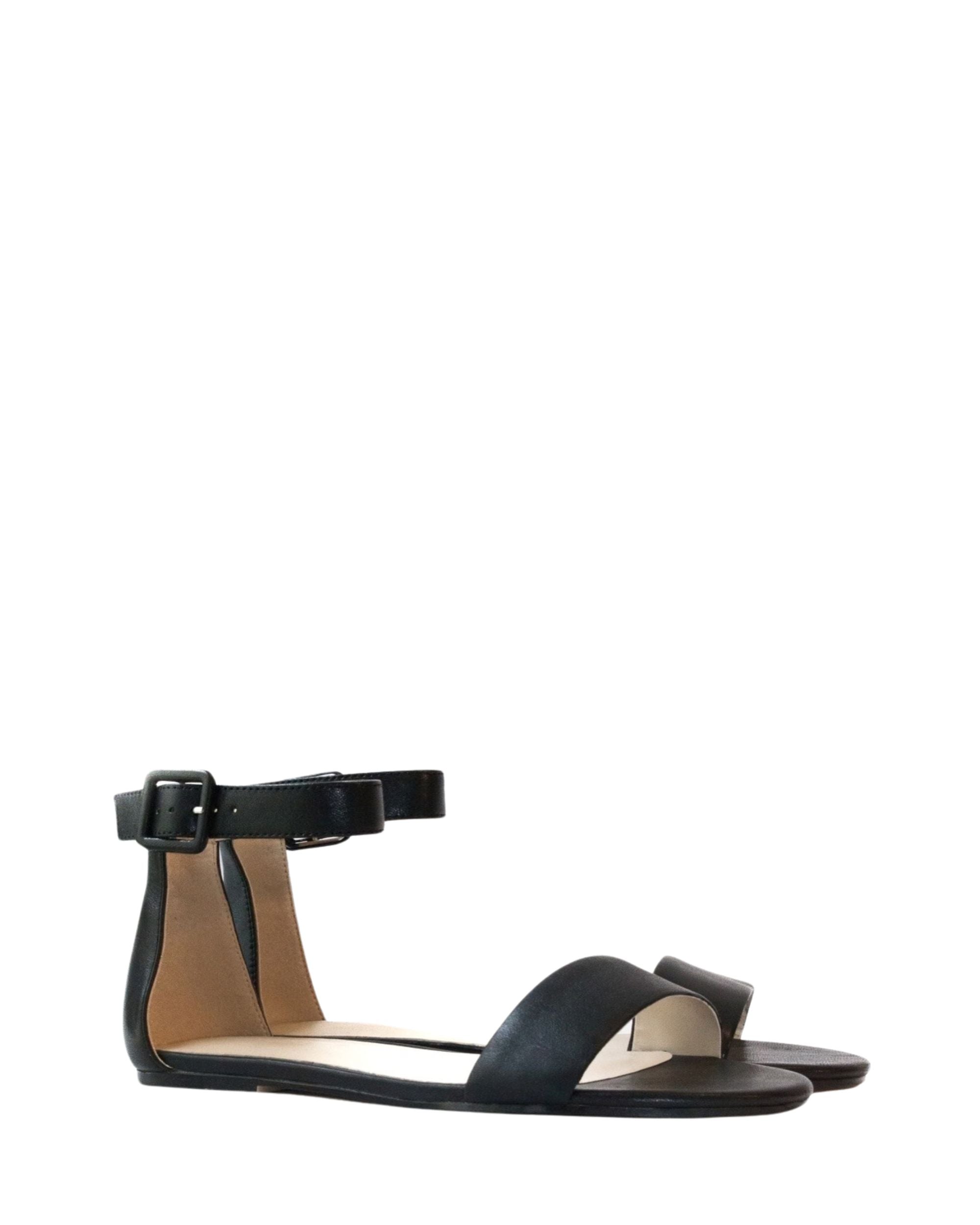 Side view women’s black leather flat sandal in extended sizes 9–14 by Bohobo