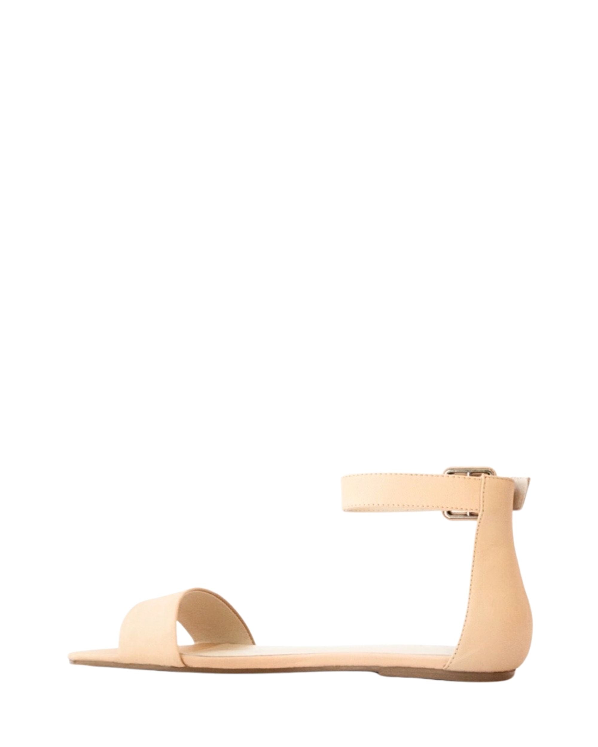 Back view women’s cream leather flat sandal in extended sizes 9–14 by Bohobo