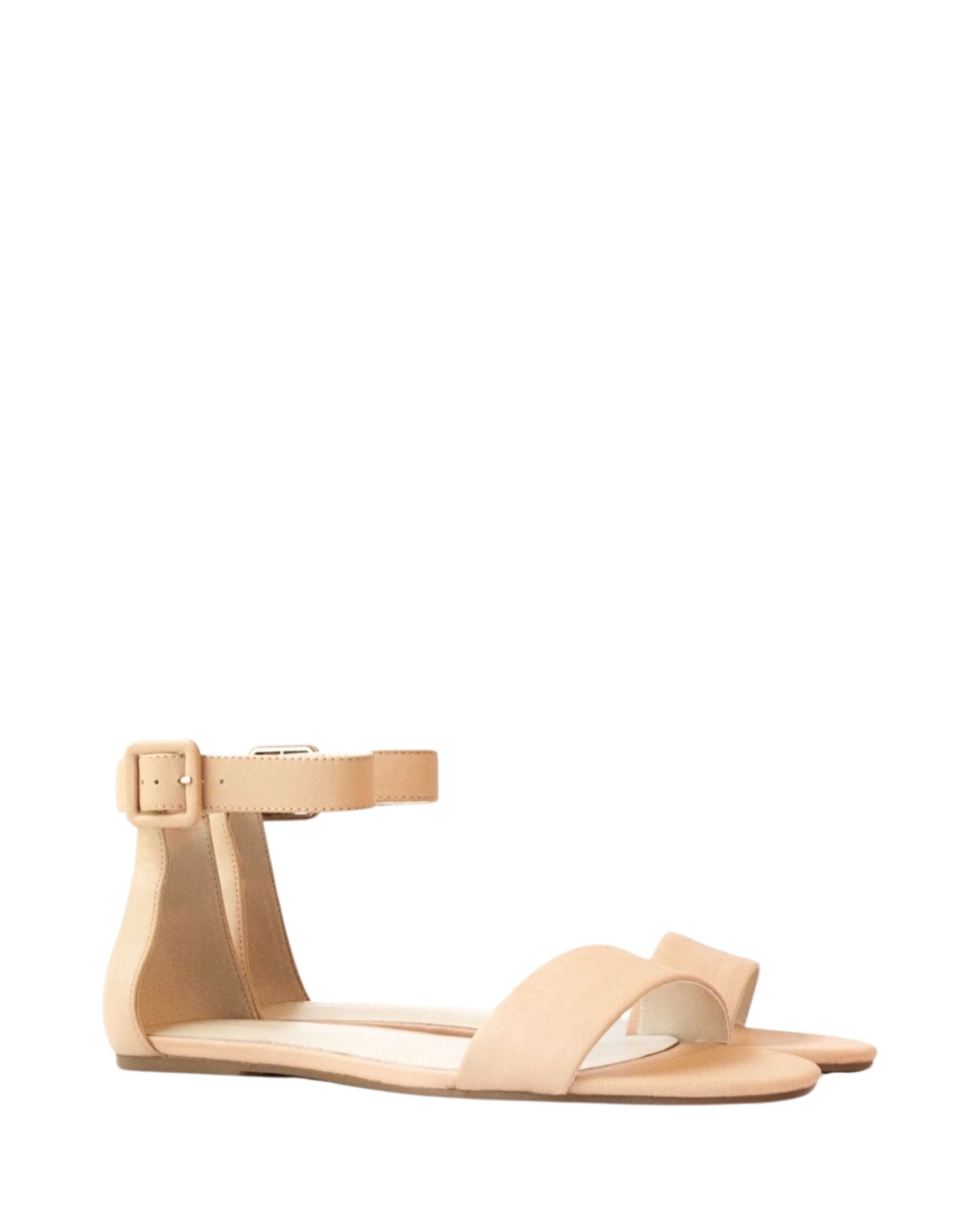 Side view women’s cream leather flat sandal in extended sizes 9–14 by Bohobo